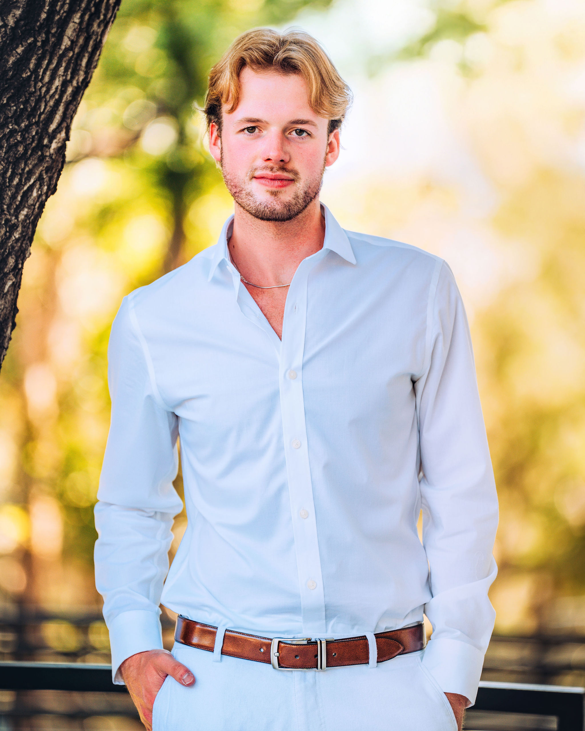 Man in white shirt outdoors