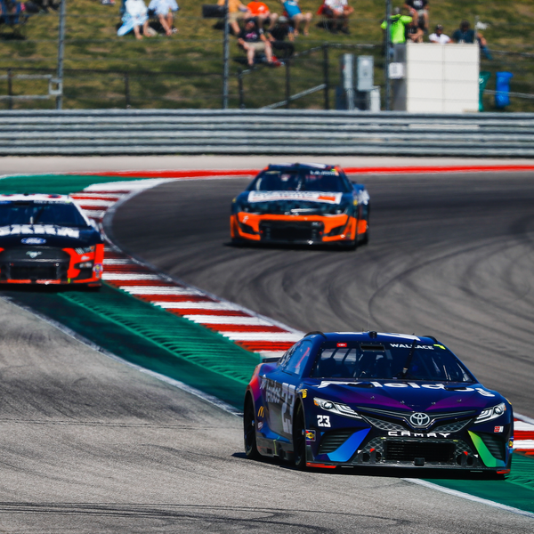 Race cars on track during motorsport event