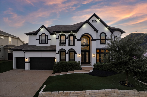 Modern two-story house at sunset