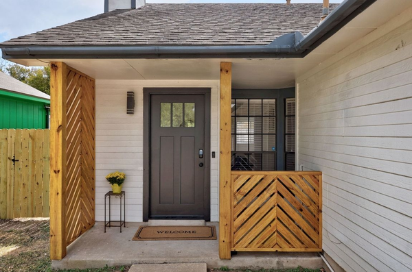 Charming house entrance with wooden accents