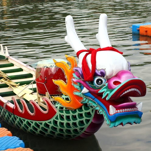 Rope Trix Colorful dragon boat on water.