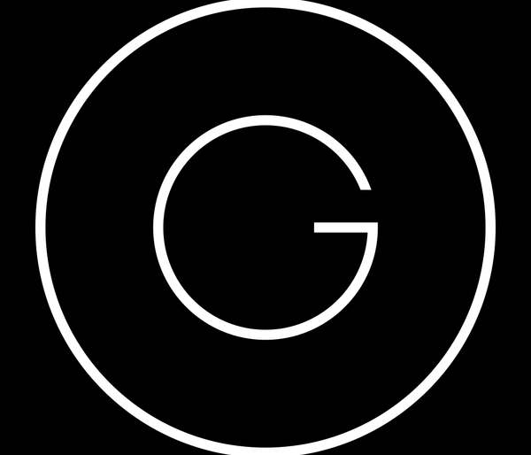 Minimalist white letter G on black background