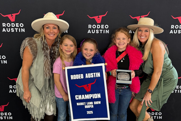 Rodeo Austin champion celebrating with family, 2025.