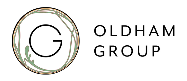 Oldham Group logo with abstract design